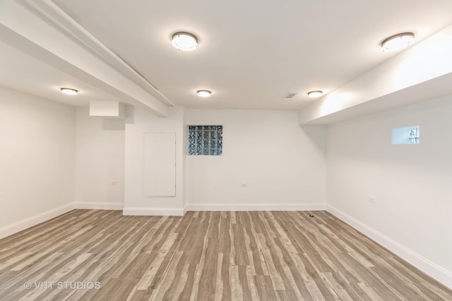 basement with light wood-type flooring