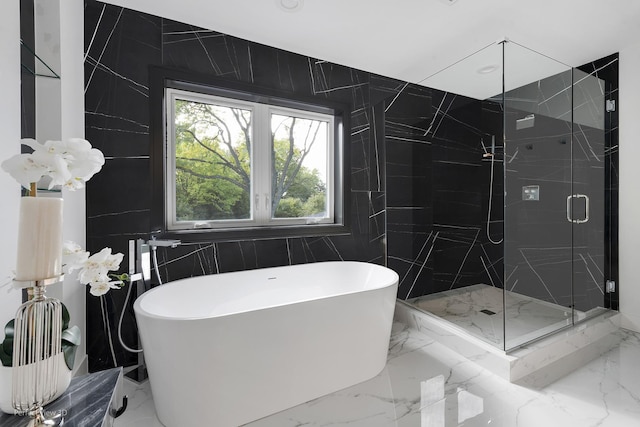 bathroom with plus walk in shower and tile walls