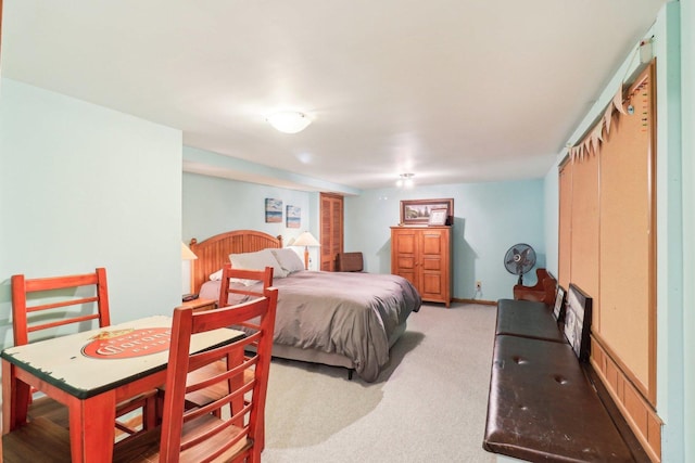 bedroom with light colored carpet