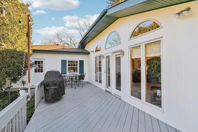 wooden deck featuring grilling area