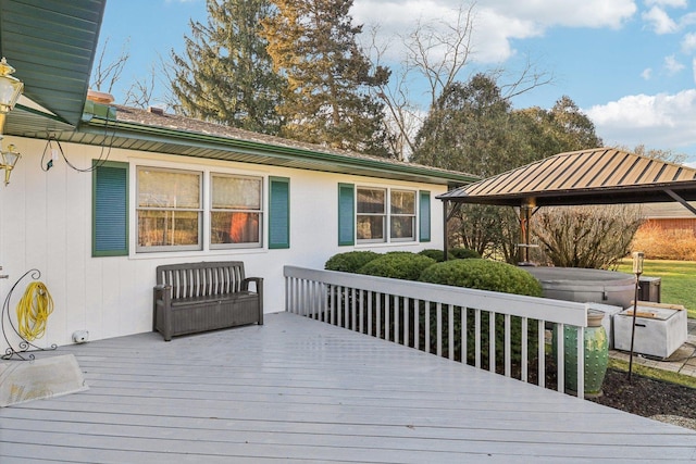 wooden deck featuring a gazebo