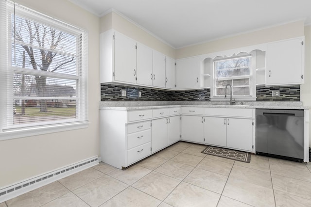 kitchen with baseboard heating, a wealth of natural light, dishwasher, and white cabinets