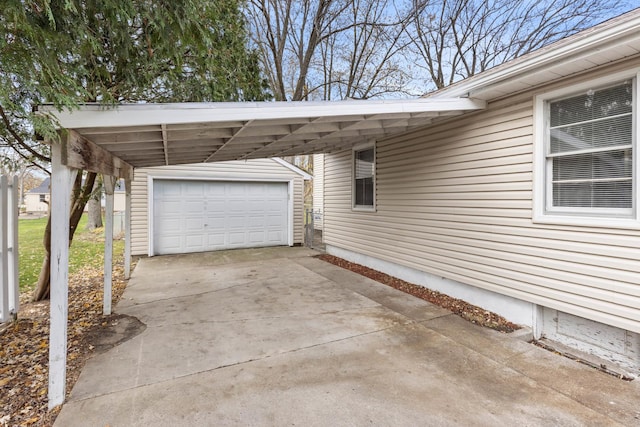 garage featuring a carport