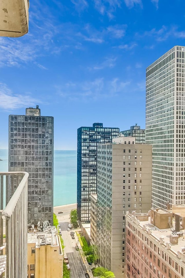 view of city featuring a view of the beach and a water view