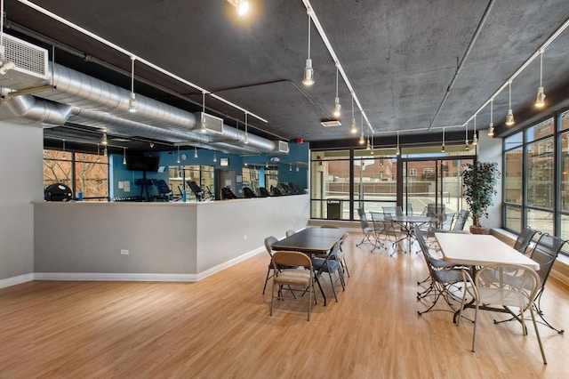 unfurnished dining area featuring hardwood / wood-style floors