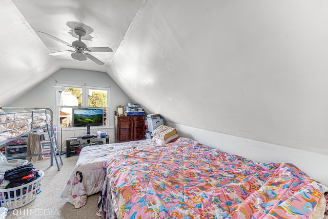 bedroom featuring ceiling fan, carpet, and lofted ceiling