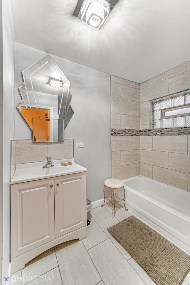 bathroom with tile patterned flooring and vanity