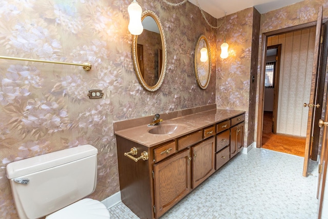 bathroom with vanity and toilet