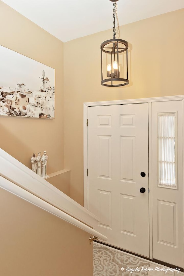 entrance foyer with an inviting chandelier