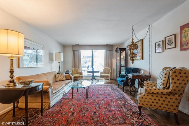 living room with parquet flooring