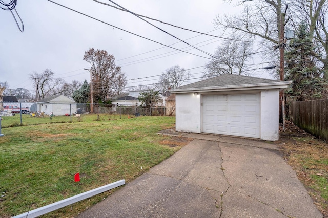 garage with a lawn