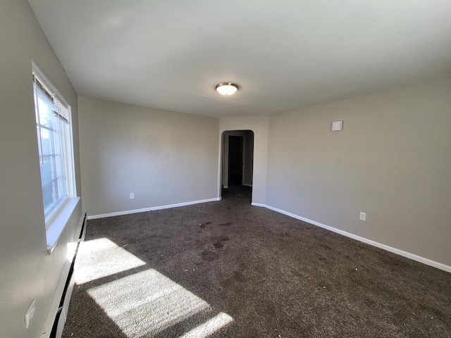 view of carpeted spare room