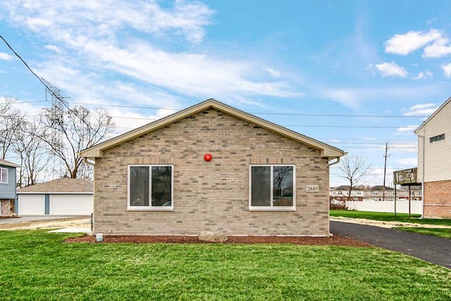 view of home's exterior featuring a lawn