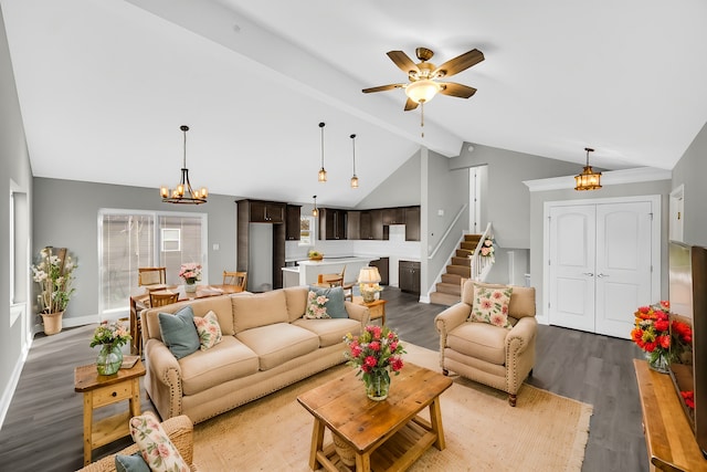 living room featuring light hardwood / wood-style floors, ceiling fan with notable chandelier, and vaulted ceiling with beams