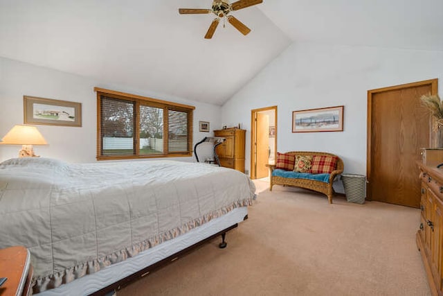 bedroom featuring light carpet, ceiling fan, and lofted ceiling