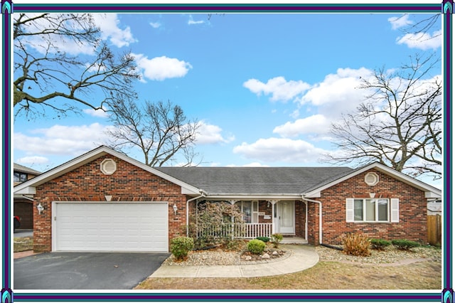 view of front of home featuring covered porch and a garage