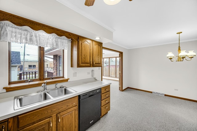 kitchen featuring dishwasher, sink, hanging light fixtures, crown molding, and light carpet