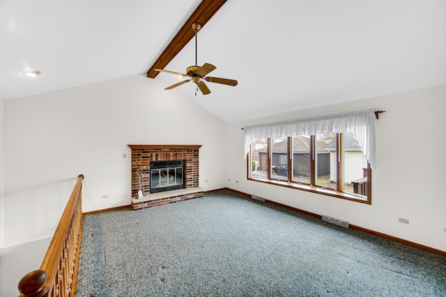 unfurnished living room featuring vaulted ceiling with beams, ceiling fan, carpet floors, and a fireplace