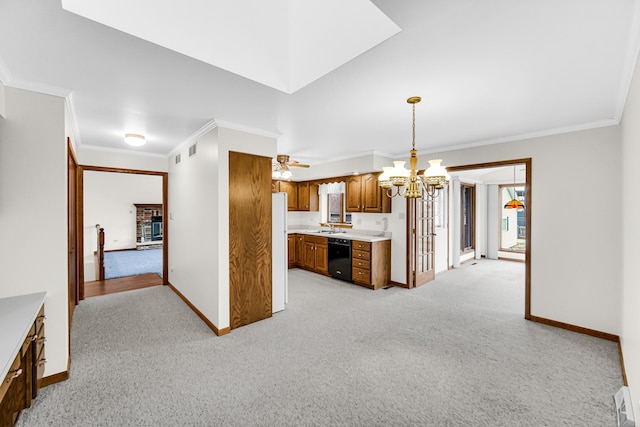 kitchen featuring dishwasher, sink, white fridge, pendant lighting, and light carpet