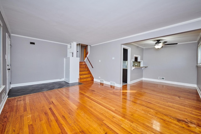 unfurnished living room with ceiling fan, light hardwood / wood-style flooring, and ornamental molding