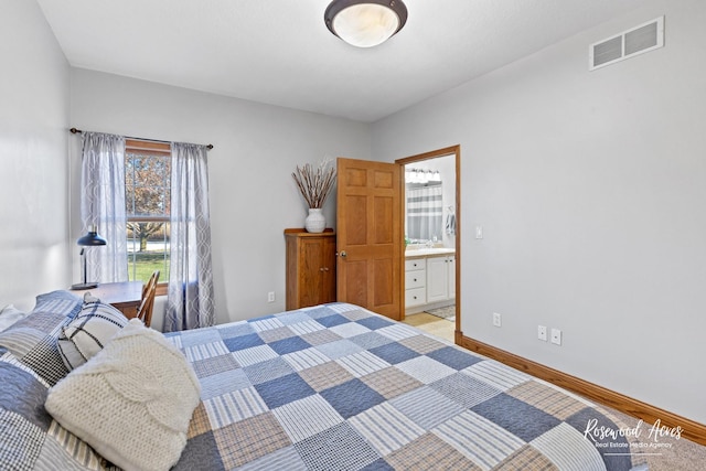 bedroom featuring connected bathroom