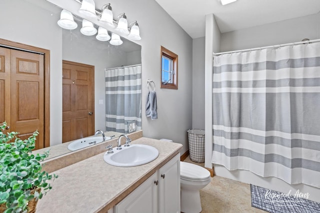 bathroom with walk in shower, tile patterned flooring, vanity, and toilet