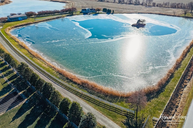 bird's eye view with a rural view and a water view