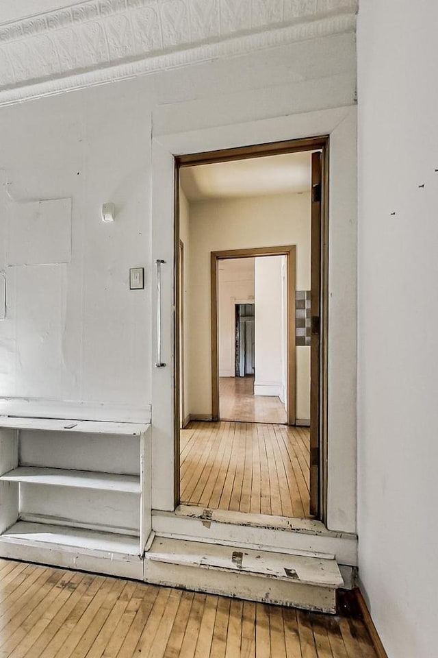 hallway featuring hardwood / wood-style flooring