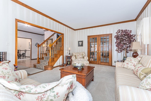 living room featuring french doors, light colored carpet, and ornamental molding