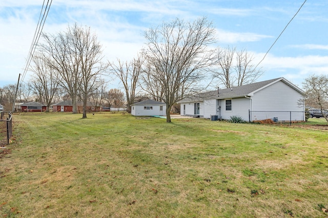 view of yard with central AC unit