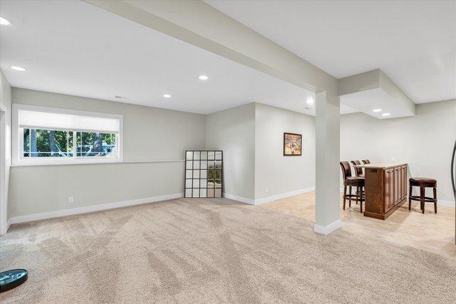 interior space featuring light colored carpet