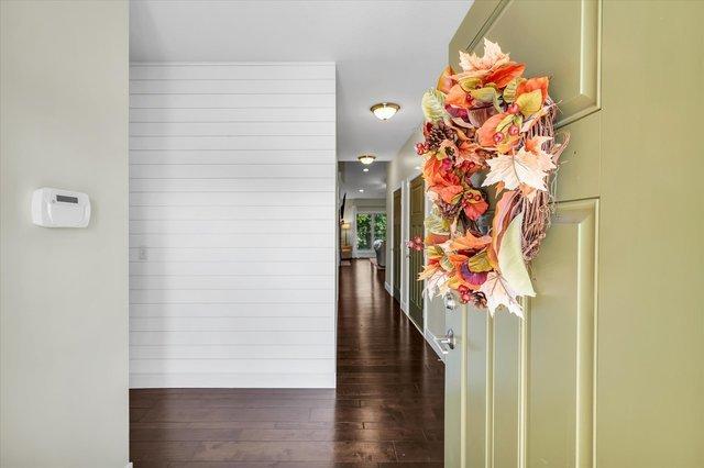 hallway featuring dark hardwood / wood-style floors