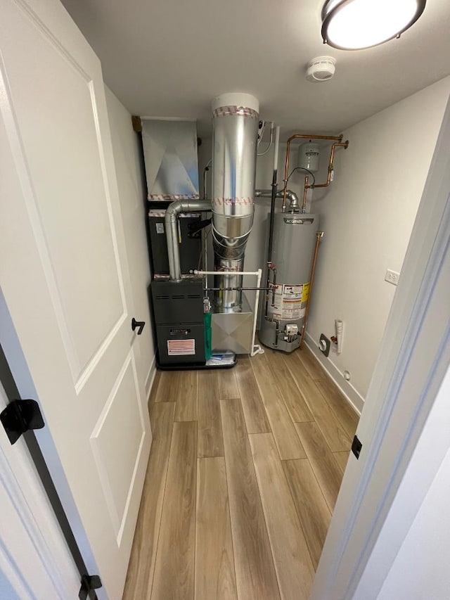 utilities featuring gas water heater and heating unit