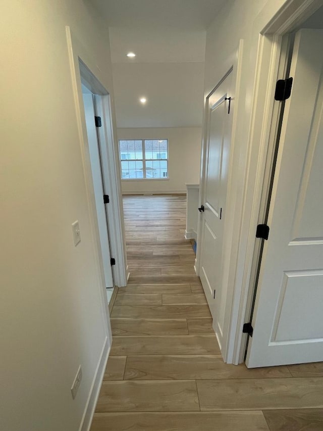 hallway featuring light hardwood / wood-style floors