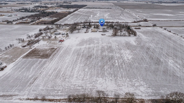 snowy aerial view with a rural view