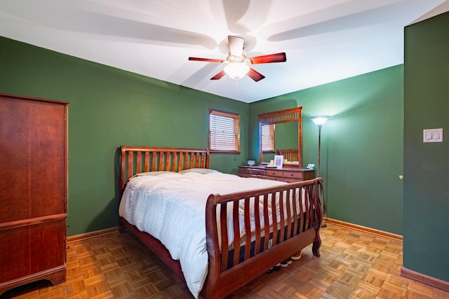 bedroom featuring light parquet flooring and ceiling fan