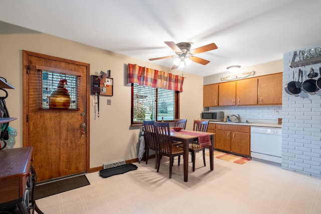 dining space with ceiling fan