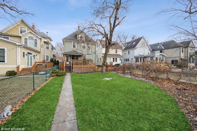 view of yard featuring a wooden deck