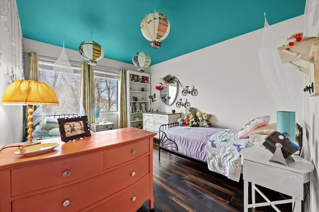 bedroom featuring dark hardwood / wood-style floors