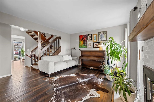 living room featuring dark wood-type flooring