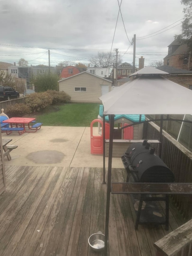 wooden deck featuring a patio area