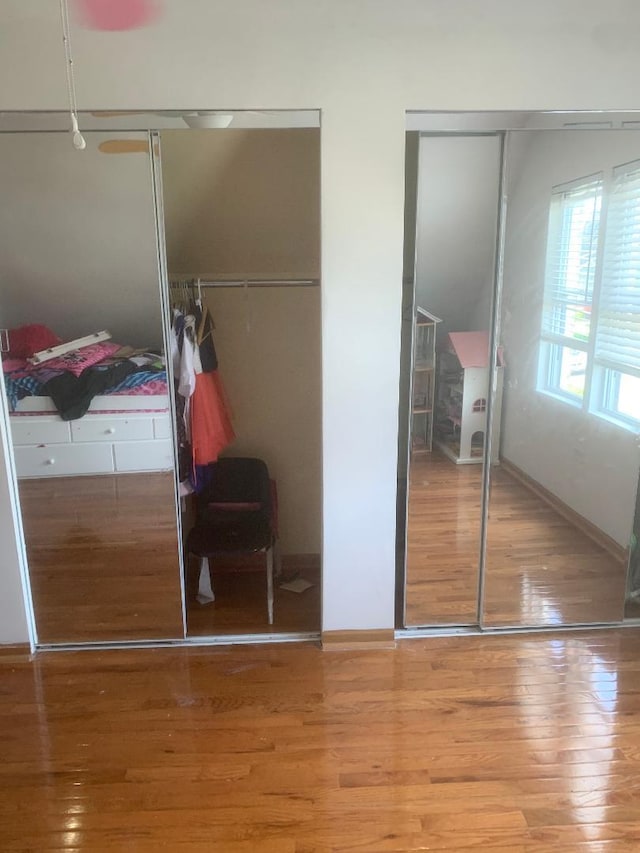 bedroom featuring hardwood / wood-style flooring