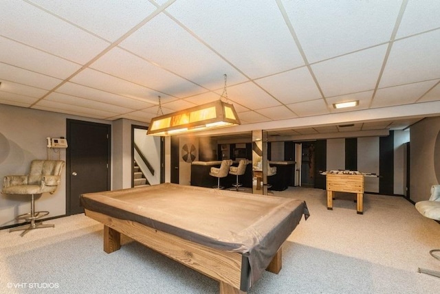 rec room with carpet, a paneled ceiling, and pool table