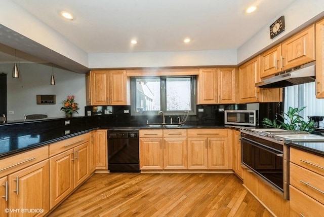 kitchen with stove, light wood-type flooring, tasteful backsplash, sink, and black dishwasher