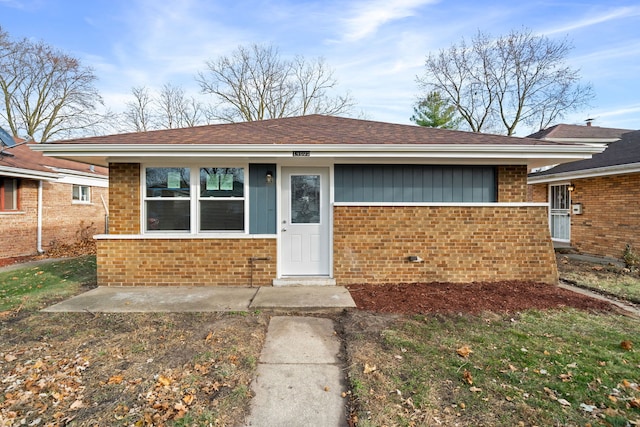 view of front of house with a patio