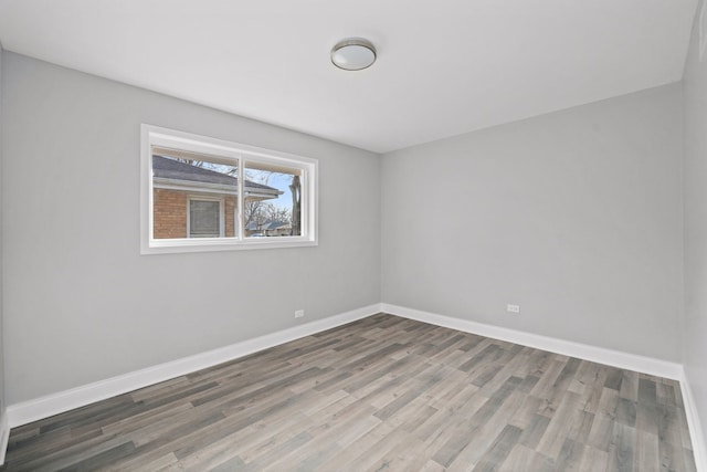 14609 Dante Ave, Dolton, IL 60419 - spare room with wood finished floors and baseboards