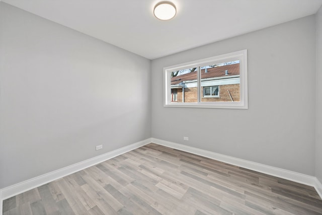 14609 Dante Ave, Dolton, IL 60419 - empty room featuring baseboards and wood finished floors