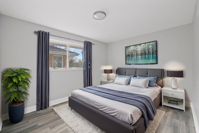 bedroom featuring hardwood / wood-style flooring