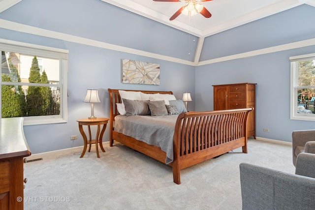 bedroom with multiple windows, baseboards, and carpet flooring