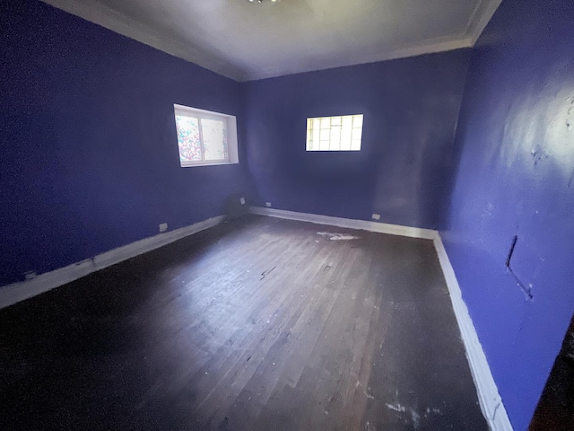 unfurnished room featuring hardwood / wood-style flooring